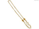 a close up of a gold necklace on a white background