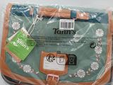 a green bag with a brown handle and a tag on it