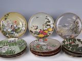 six plates with different designs of birds and flowers on them
