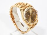 an image of a gold rolex watch with diamonds on the dial