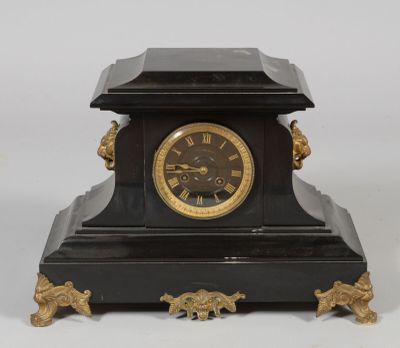 a clock that is sitting on top of a table