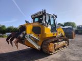 a picture of a yellow bulldozer parked in a parking lot
