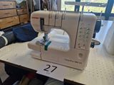 a sewing machine that is sitting on a table