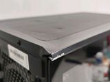 a close up of a black computer case with a label on it
