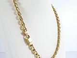 a gold chain necklace on a mannequin mannequin mannequin mannequin mannequin mannequin mannequin mannequin manne