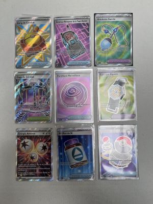 many different types of pokemon trading cards in the package