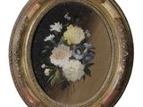 une image représentant un tableau de fleurs dans un cadre doré