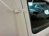 a white van with a sticker on the side of it