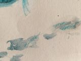 a drawing of a blue bird on a piece of paper