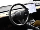 a steering wheel and dashboard of a tesla model s