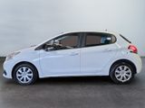 the white car is parked in a large room with a gray floor