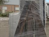 a large pile of construction materials sitting on a pallet