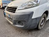 a white van parked on the side of the road