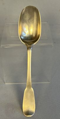 a spoon that is sitting on a table