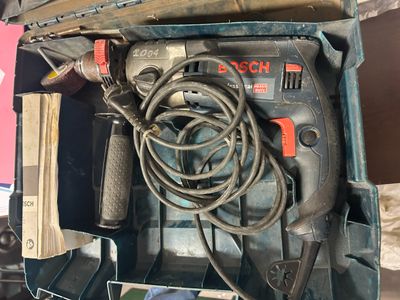 a box with tools in it on a table