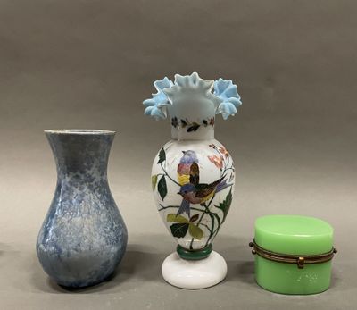 three vases sitting next to each other on a table