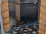 a white van with a bed in the back of it