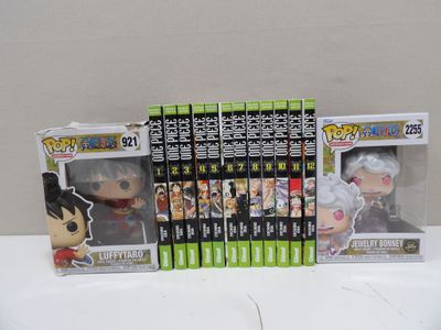 funko pop vinyl figures are displayed on a table in front of a white wall