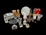 a lot of glass items that are on a table