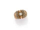 a diamond and eighteen karat gold ring