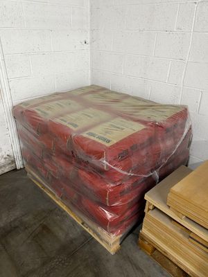 a bed in a room that is wrapped in plastic