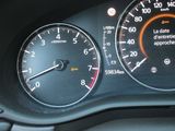 a close up of a speedometer in a car