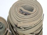a roll of fabric with a metal hook on it