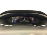a close up of the dashboard of a car with a digital display