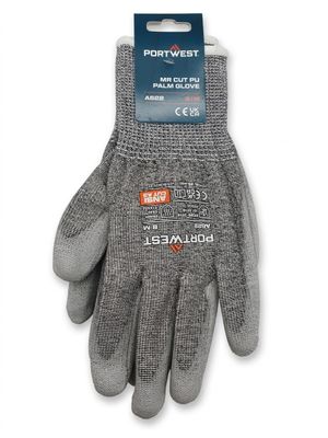 a pair of gray gloves with a black label on the front