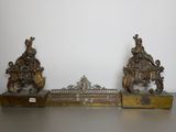 three antique bronze figurines of a man and woman on a bench
