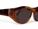 brown tortoise sunglasses on a white background on a white surface