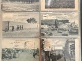 an old photo of a book with pictures of people on the pages