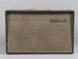 a close up of a guitar amplifier sitting on top of a table