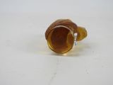a small glass cup that is sitting on a table