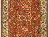 a red rug with a floral design on it