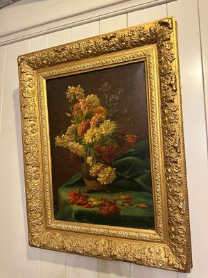 a picture of a painting hanging on the wall