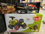 a box with a toy tractor on it and a box with a toy tractor on it