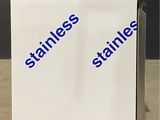 the sign is attached to the side of a metal cart