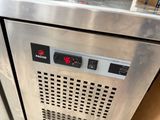 an image of a stainless steel dishwasher in a kitchen