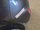 a sticker on the back of a car that says pluto