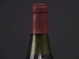 a bottle of wine that is sitting on a table