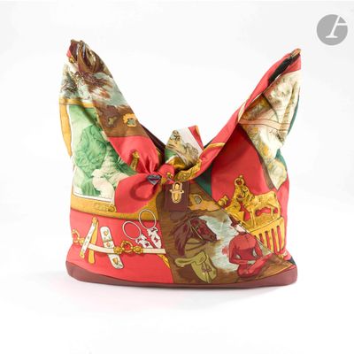 une image représentant un sac à main orné d'un nœud
