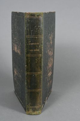 an old book sitting on top of a table
