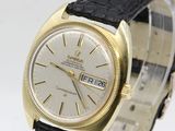 an image of a gold and black watch with a white dial