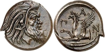 a silver coin with an image of a man and a bird on it