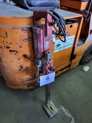 a forklift with a seat on top of it in a warehouse