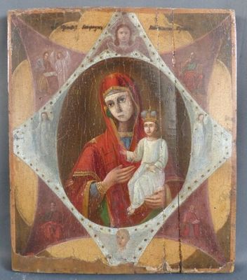une peinture ancienne représentant une femme tenant un bébé dans ses bras