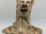 brass statue of a horse with a mouth open