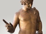 an image of a statue of a man with a knife in his hand