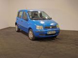 a blue car that is parked in a room